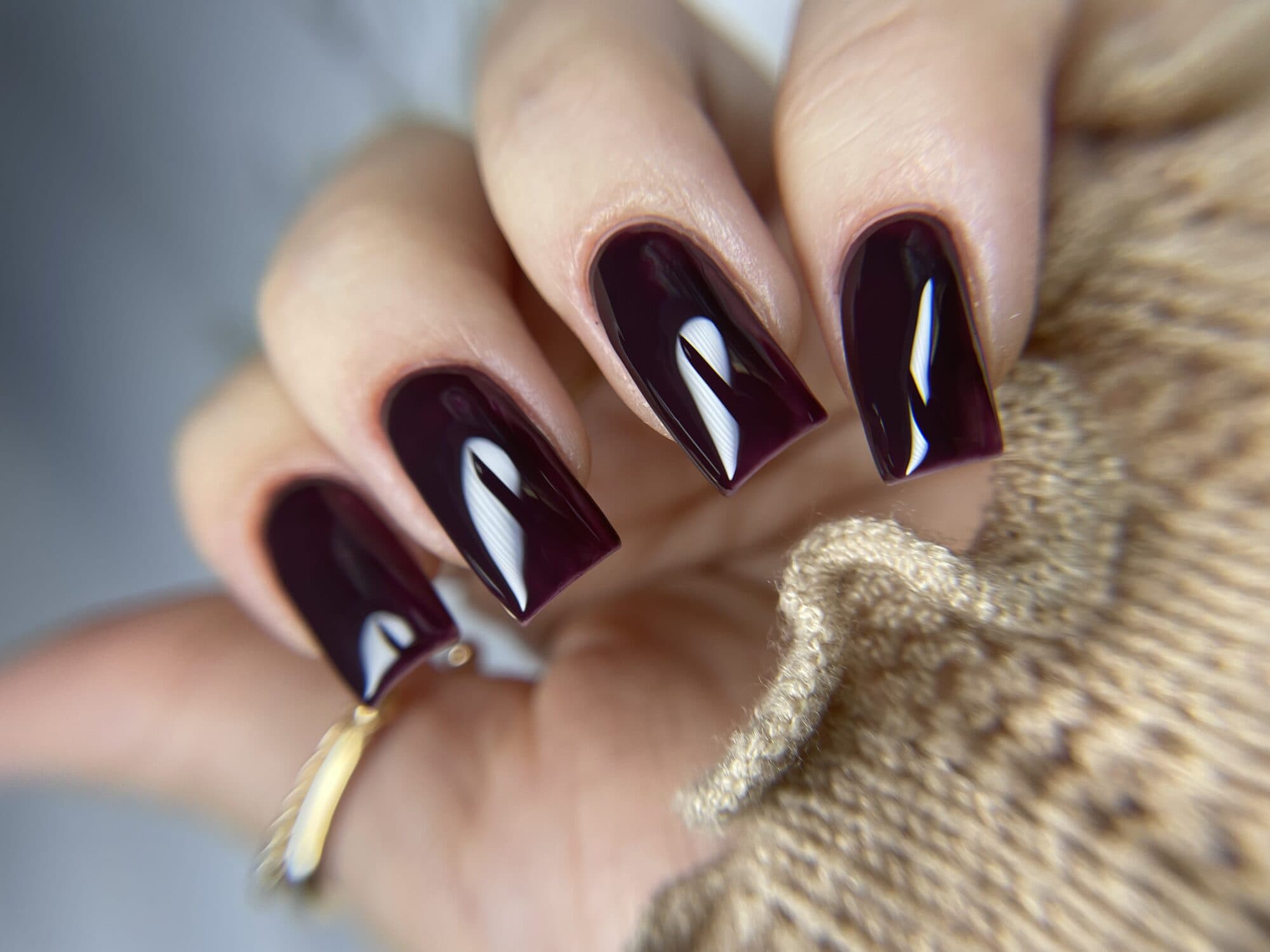 Deep burgundy glossy square nails