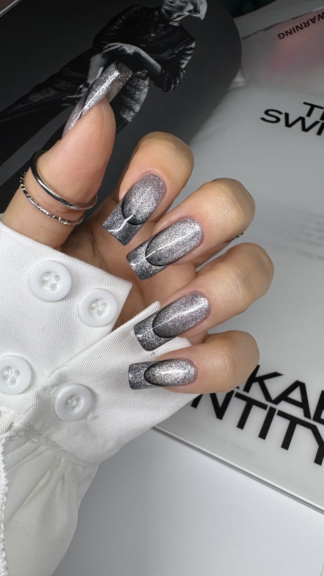 Silver chrome coffin nails with black and white marble accents