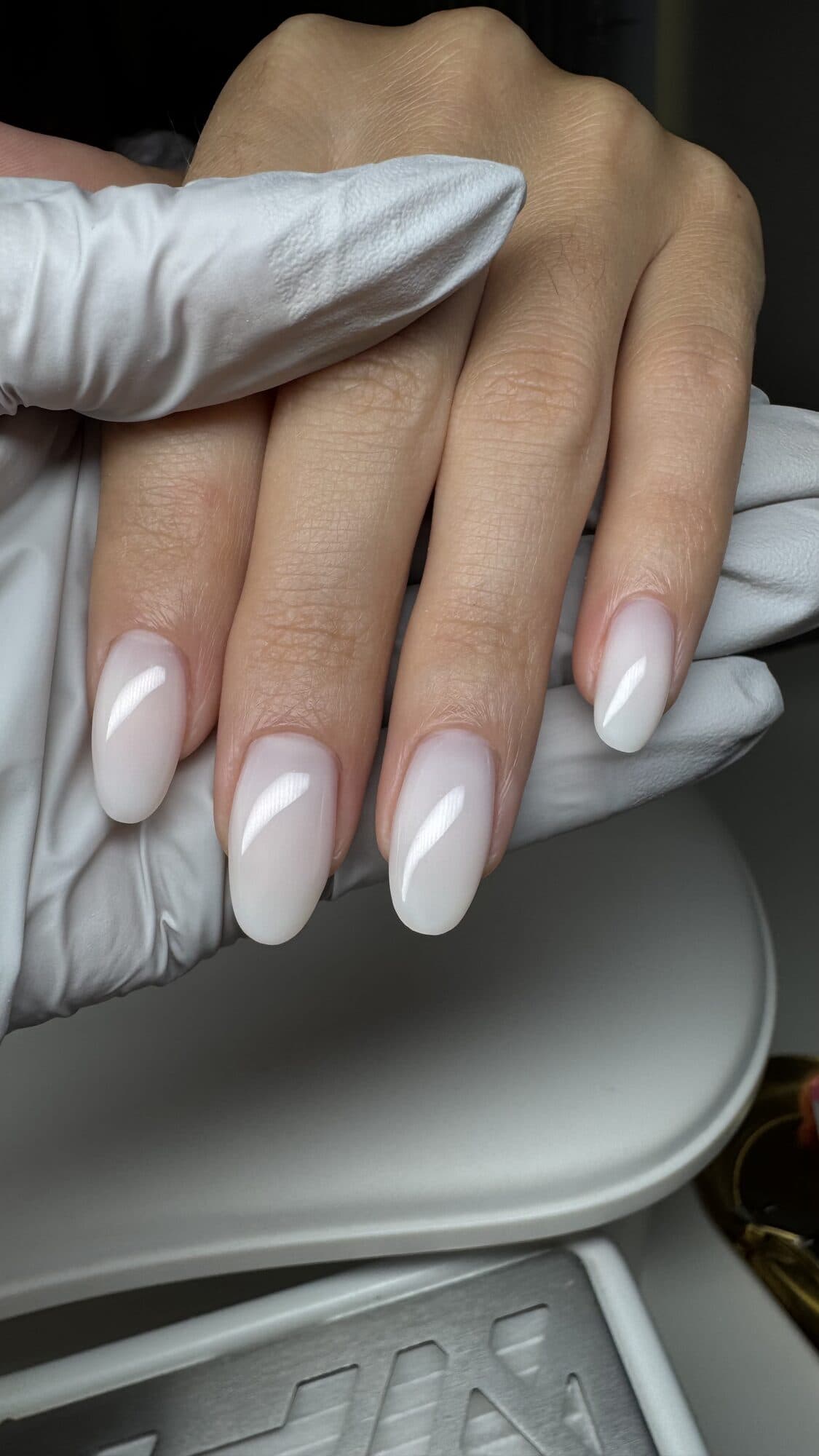 Milky white almond nails at natural length