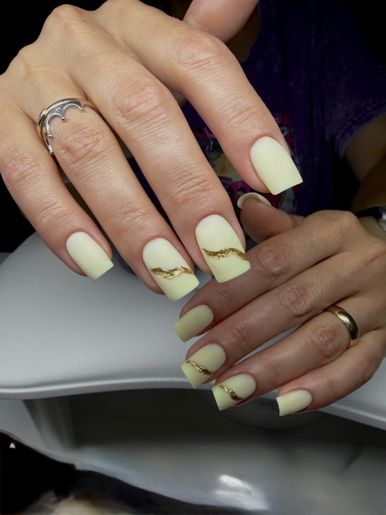 Pale yellow square nails with a soft ombre